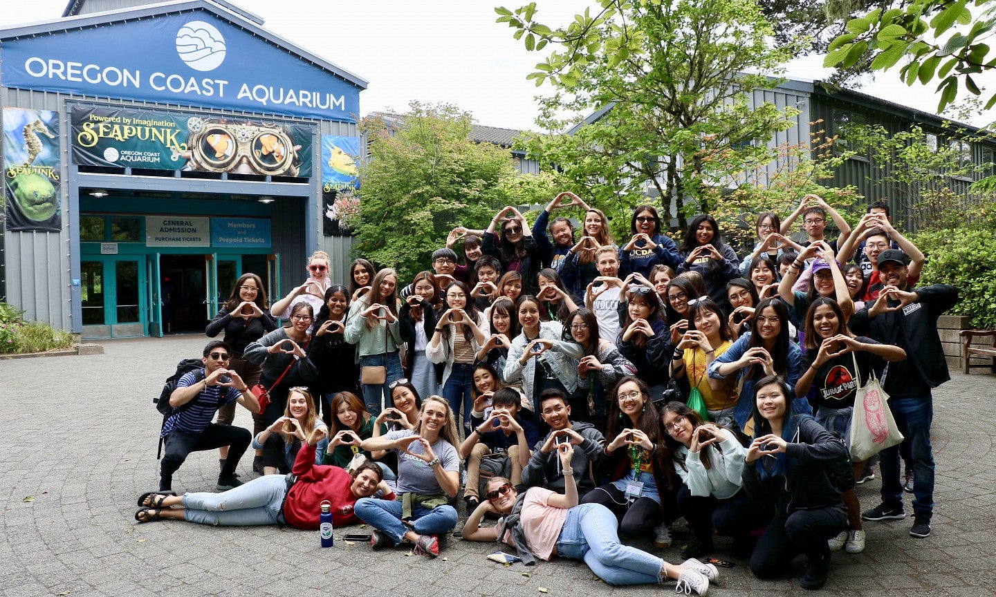 GLC Group photo in front of Oregon Aquarium