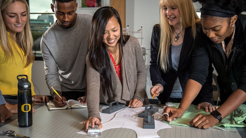 students work on product design