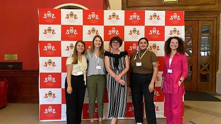 Group of students posing at a conference in the Galapagos, Ecuador